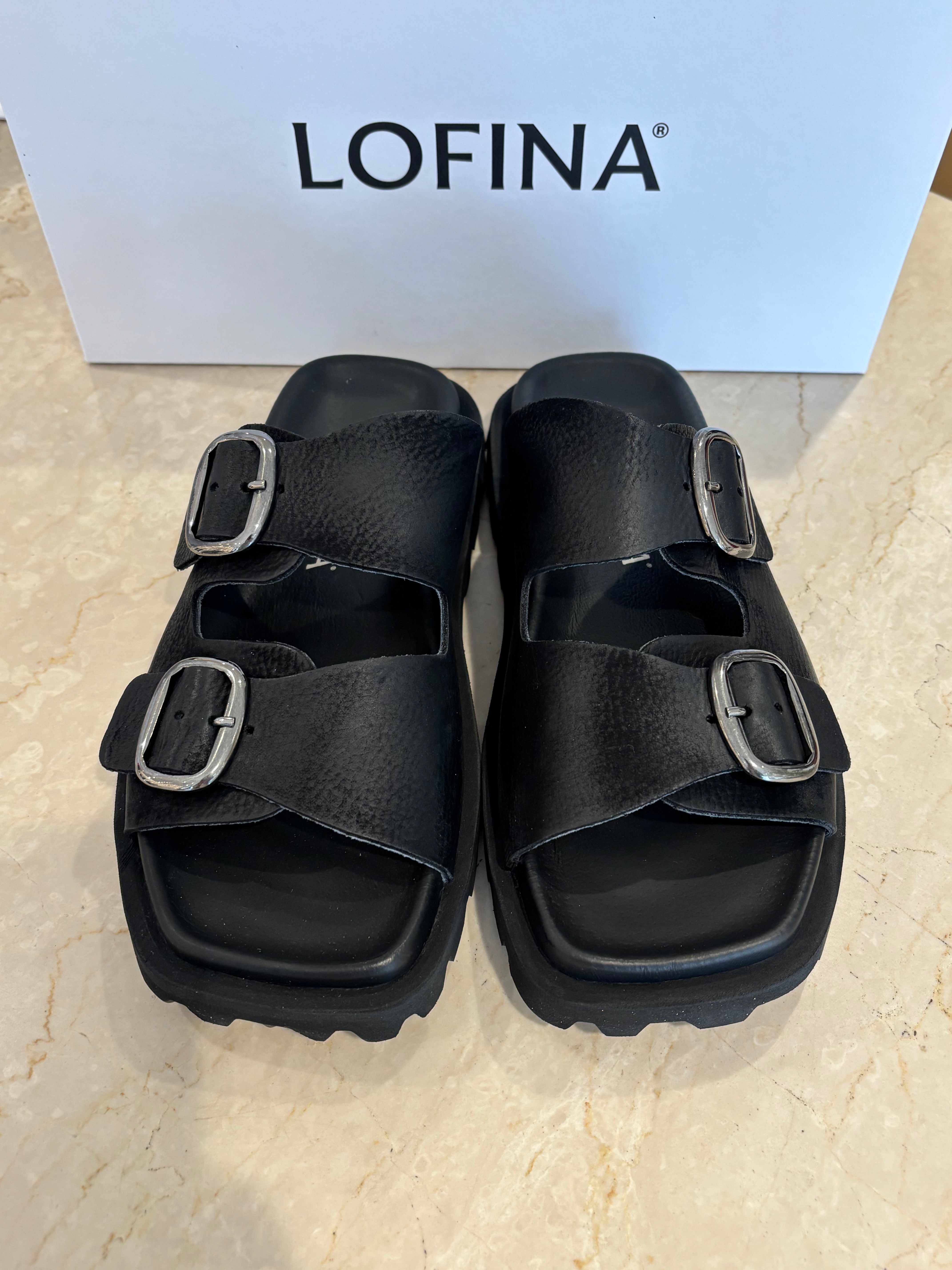 Lofina Sandal with buckles and a footbed sole